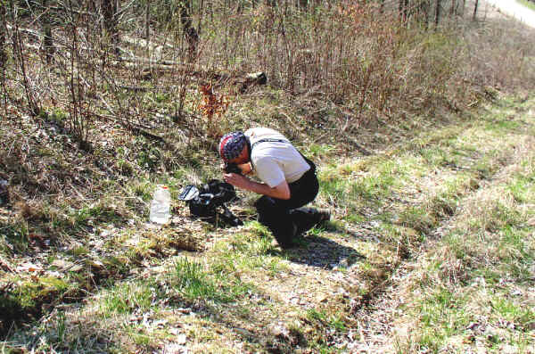 Dr. Arsen Faradzhev photographing petroglyphs at 33GU218 (Day's Knob)